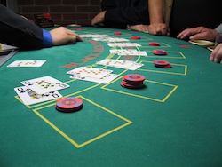 blackjack board with chips
