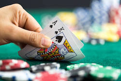 blackjack cards with hand